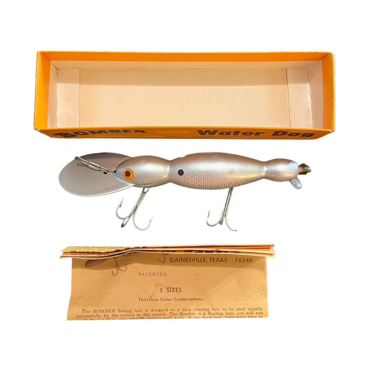 bomber waterdog fishing lure Wooden Water Dog 1500 Series, #59 Yellow Coachdog Color Equipped with treble hooks to improve hookup rates during strikes Vintage Wooden Bomber Water Dog