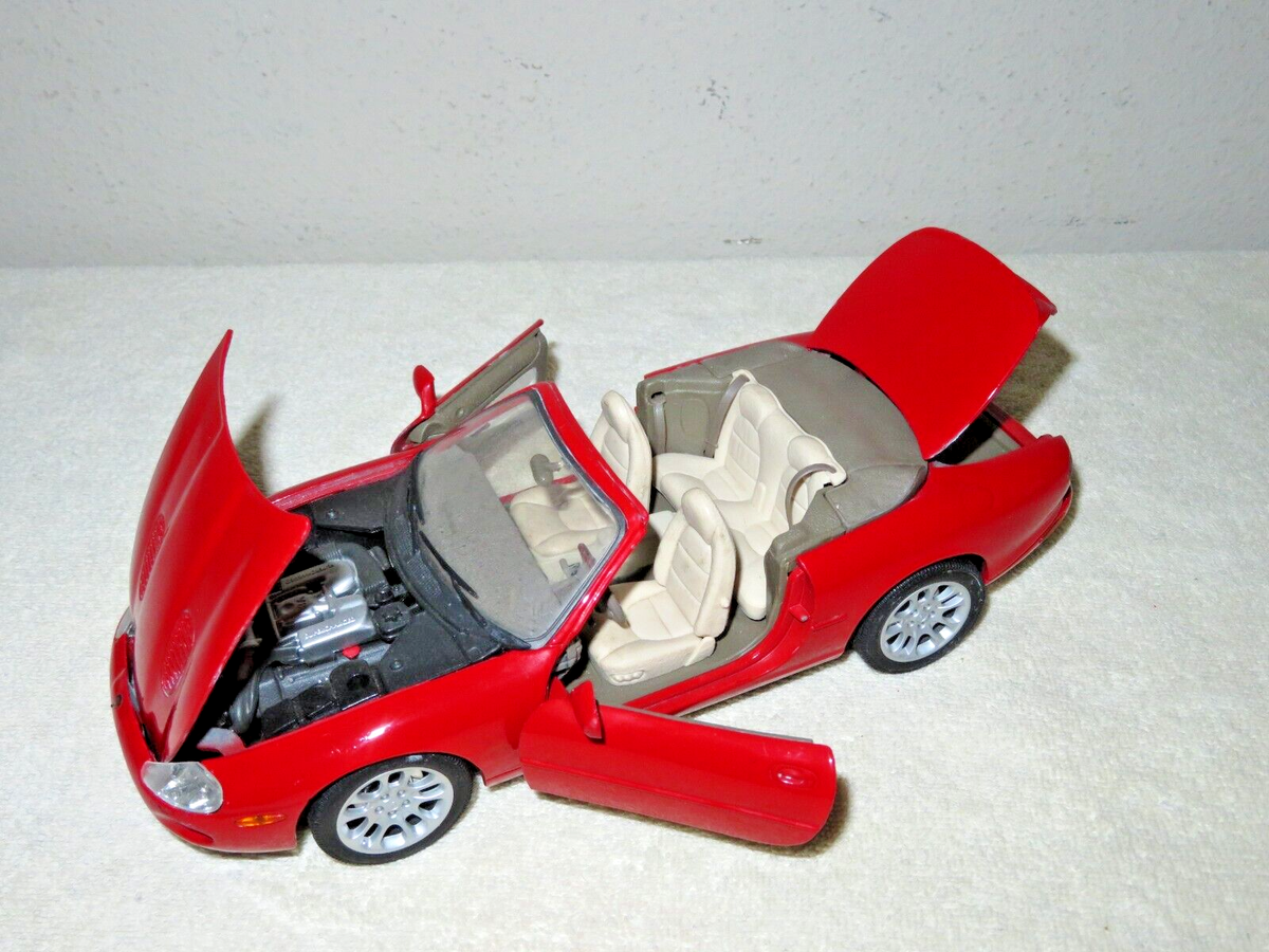 ミニカー Maisto il_1080xN.6220070462_5t4m.jpg 1/18 Series XK Jaguar ミニカー