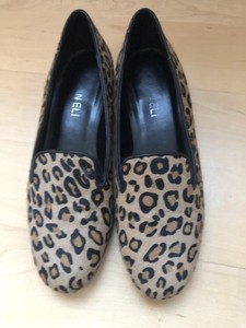 leopard van slip ons
