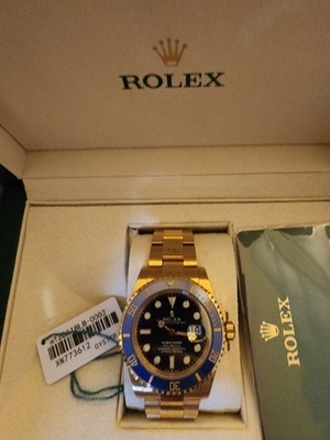 Rolex Submariner Date (Bluesy)   18k yellow gold, blue dial/bezel