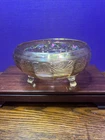Vintage carnival glass round three footed bowl, daisy pattern