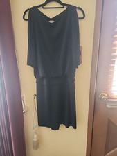 Little Black Dress Size Large With A Sash Waist And Slith Short Sleeves