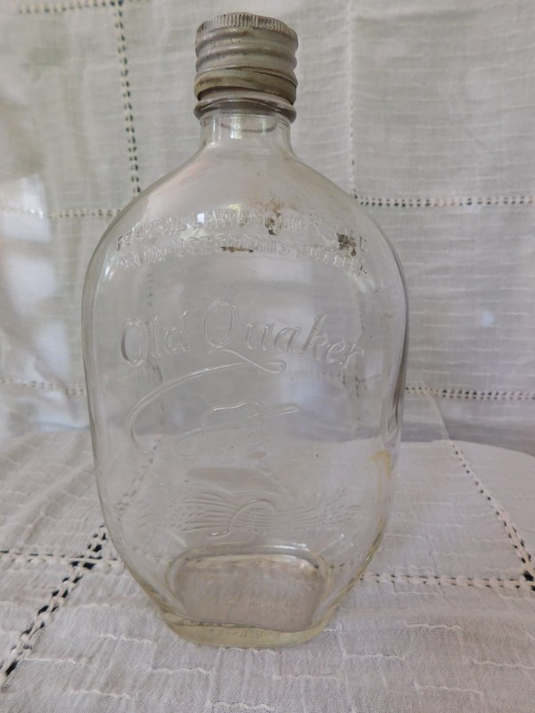 OLD QUAKER Pint Whiskey Bottle Clear Embossed with Twist Lid