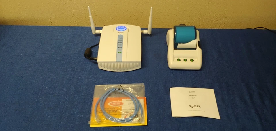 Router punto de acceso inalámbrico ZyXel Zyair G-4100 v2 con impresora SP-200E Foto 2 de 4