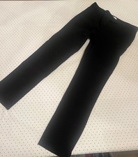 Classic tailored black trousers with sleek minimalist office styling