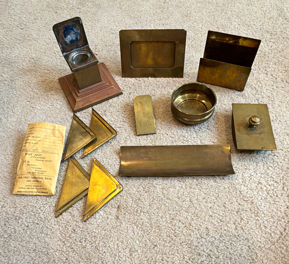 A signed 10-piece Bradley & Hubbard Art Deco brass desk set is a genuine collectible — the kind of thing that anchors an entire room.