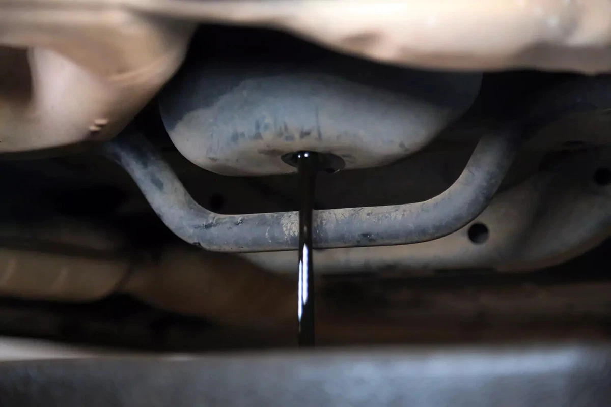 Oil draining from an engine.