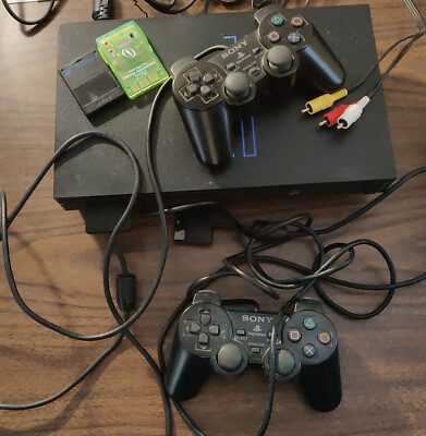 Sony PlayStation 2 Console with controller, memory cards, cables