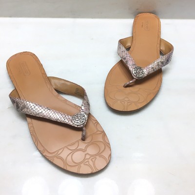 pink leather flip flops