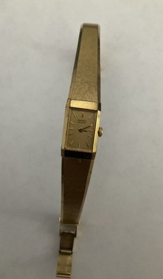 Vintage Seiko Quartz Gold Tone Womens Watch 2E20-5029 New Battery Runs Vintage Seiko Bangle Watch Womens 12mm Gold Tone 2E20-5029  main image 2