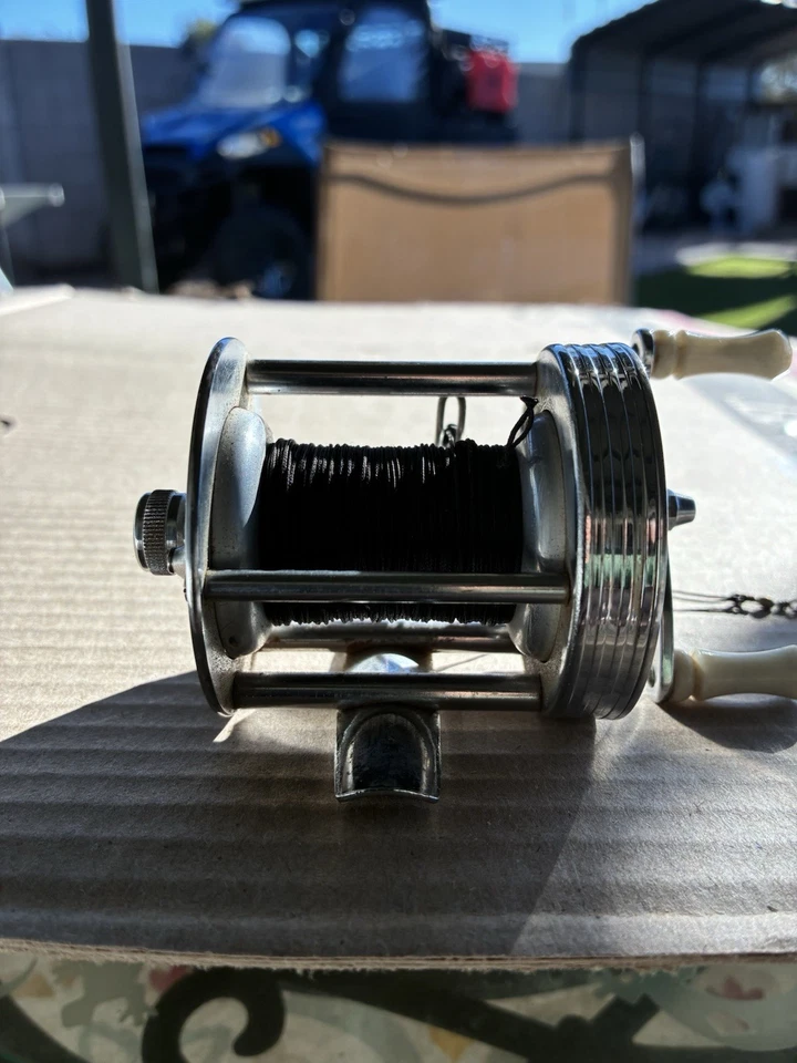 Carrete de pesca vintage Jc Higgins con estuche de cuero. Nunca he visto 1 con estuche Foto 4 de 4