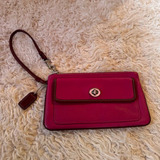 Coach Legacy turn lock wristlet in perfect conditions
