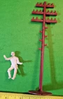 VINTAGE MARX ELECTRIC LINEMAN ON POLE WITH STEPS IN RED BROWN.........