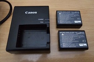 Genuine Canon LC-E10E Charger + 2x LP-E10 Li-Ion Batteries