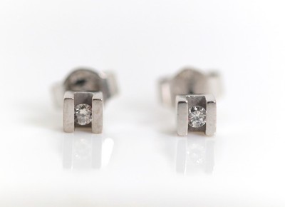 White gold stud earrings brilliant tension setting 0.04ct - 14kt - 585 display side 3.9mm