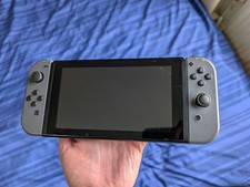 Used Grey Nintendo Switch with Joy-Con Controllers, dock, charger and FIFA 2020