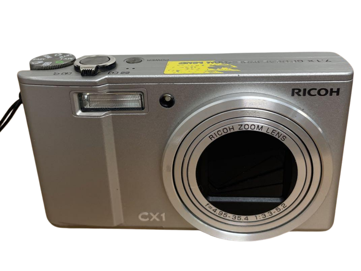 Ricoh CX1 Silver Compact Digital Camera 9.29MP 7.1x Optical Zoom