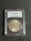 1885 MORGAN SILVER DOLLAR $1 PCGS MS63 (EDGE TONING ON RIM)
