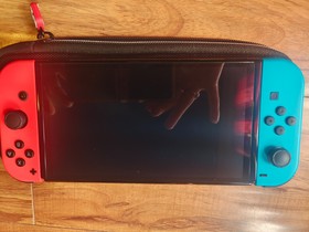 Excellent Nintendo switch OLED bundle with games and case