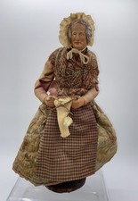 Santon   Simone JOUGLAS  28  cm  Signature  manuelle sous le socle Couturière