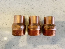 (3) Mueller Industries 1-1/4” male adapters copper