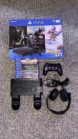Play Station Slim 1- TB, 3 Controllers, 10 Games, 1 USB mic.  1 Fan/Charge Stand