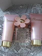 BLOSSOM 3 LOT EAU DE PERFUM 2.5 OZ BODY LOTION & SHAWER GEL 5. OZ EACH ONE