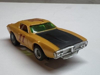 Aurora AFX HO #11 Butterscotch Dodge Charger Stock Slot Car