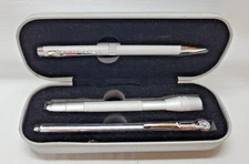 AUTO ACCESORY KIT- CHEVROLET TIN- BOX INCLUDES ,TIRE GAUGE ,PEN,FLASHLIGHT  (C4)