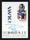 2012 National Treasures Signature Materials 21/99 Russell Wilson Rookie Auto RC