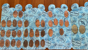 WALT DISNEY WORLD set PRESSED COIN COLLECTION lot 30 Penny 2 Nickels wallet