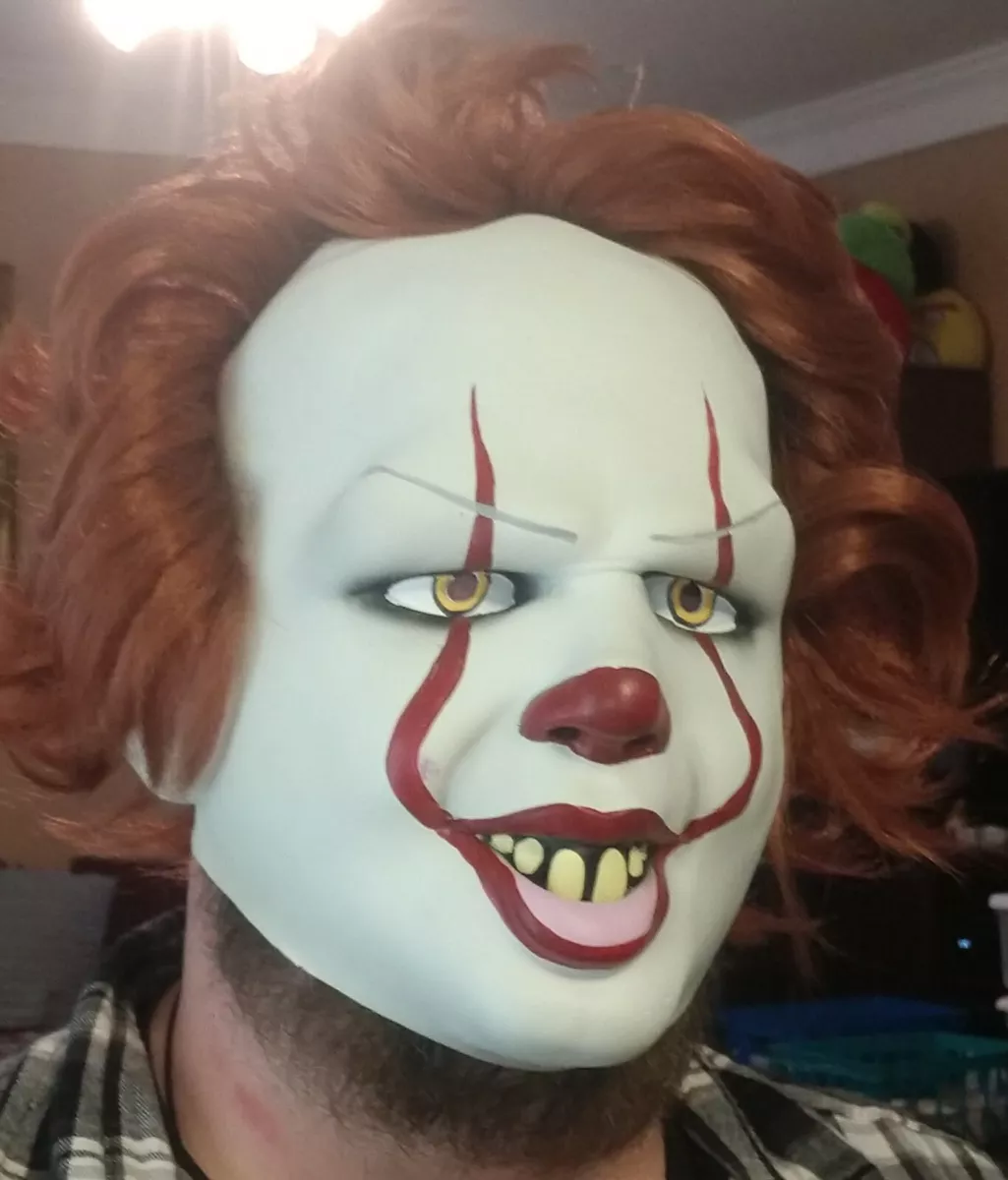 A Man Costumed as Pennywise Making Scary Face Reaction · Free