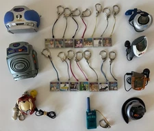 Lot Of 07 Tiger Electronics Hit Clips Music Players 14 Cartridges & FM Hit RARE