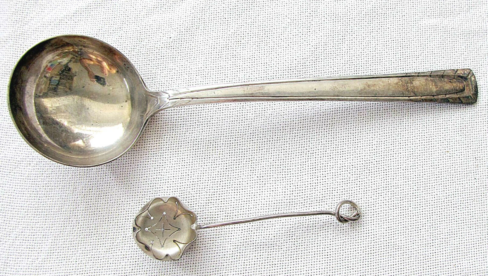 2 French art deco silver plated table ware items: Ladle and Tea Strainer