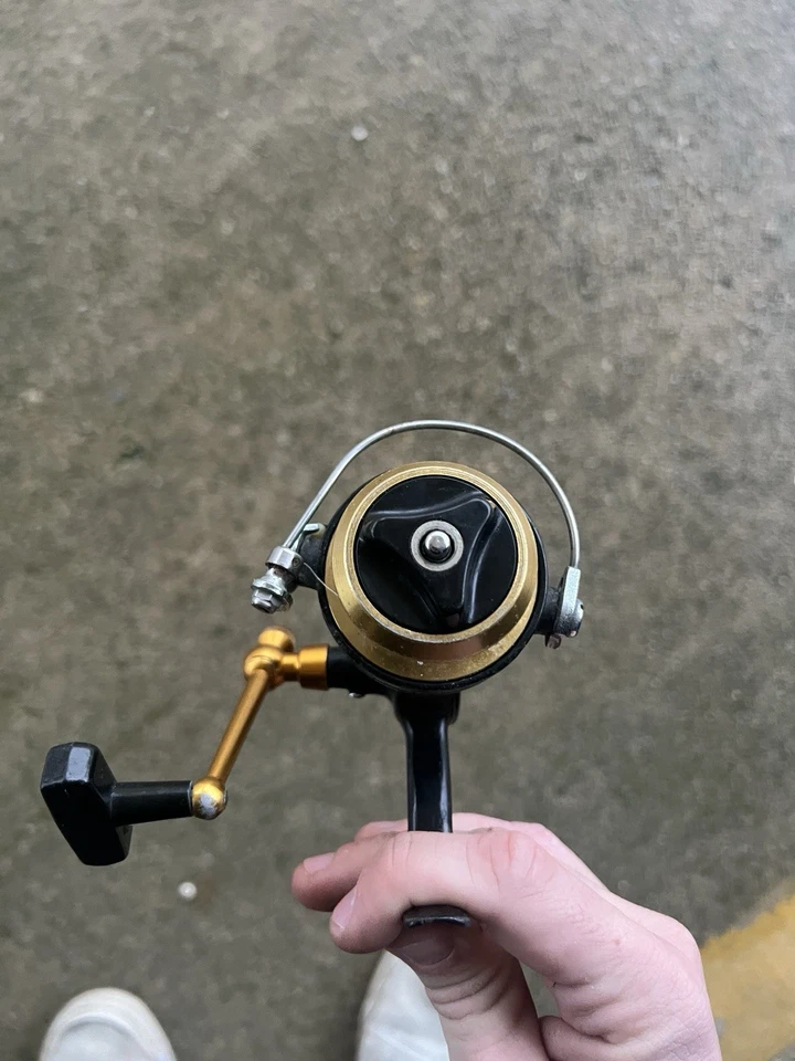 CARRETE GIRATORIO PENN #714Z ULTRA SPORT CON MANGO PLEGABLE Y LÍNEA. FUNCIONA MUY BIEN Foto 3 de 4