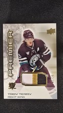 2024-25 Premier Hockey #19 Troy Terry Gold Premium Mem 3 Colour Patch 1/25 Ducks