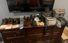 3 Nikon Cameras, 8 Nikon Lenses, 3 Tri-Pods, 3 Bags, Filters, Lense Covers, Etc