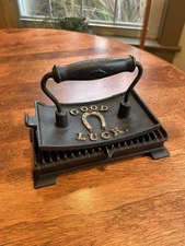 ANTIQUE RUFFLE IRON GOOD LUCK (AH)