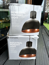 Hanging ceiling pendant light in black and bronze