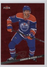 2025-26 Upper Deck Fleer Ultra Medallions Ruby Red 31/50 Connor McDavid #M-10