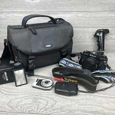 Nikon EM 35mm SLR Film Camera w 50mm 1.8 Nikon Series E Lens Bag and Accessories