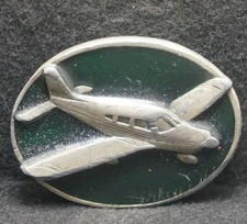 XC25109 VINTAGE 1984 AIRPLANE IN FLIGHT AIRCRAFT ARTWORK PEWTER BELT BUCKLE