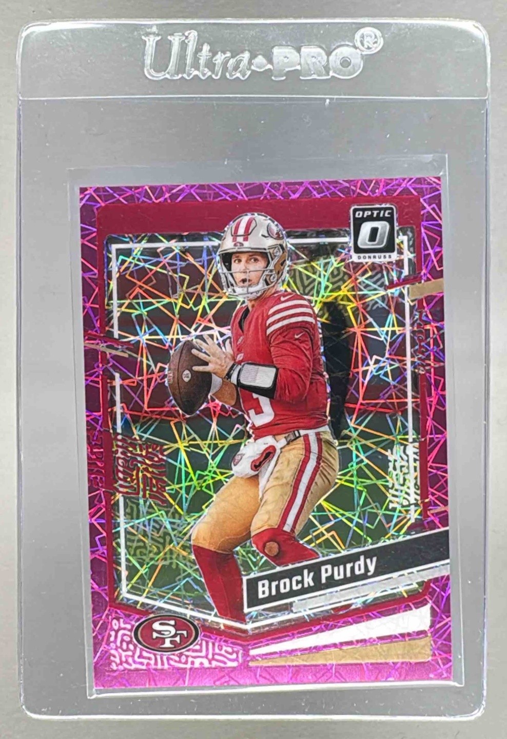 Brock Purdy 2023 Panini Donruss Optic #168 Pink Velocity Prizm /79