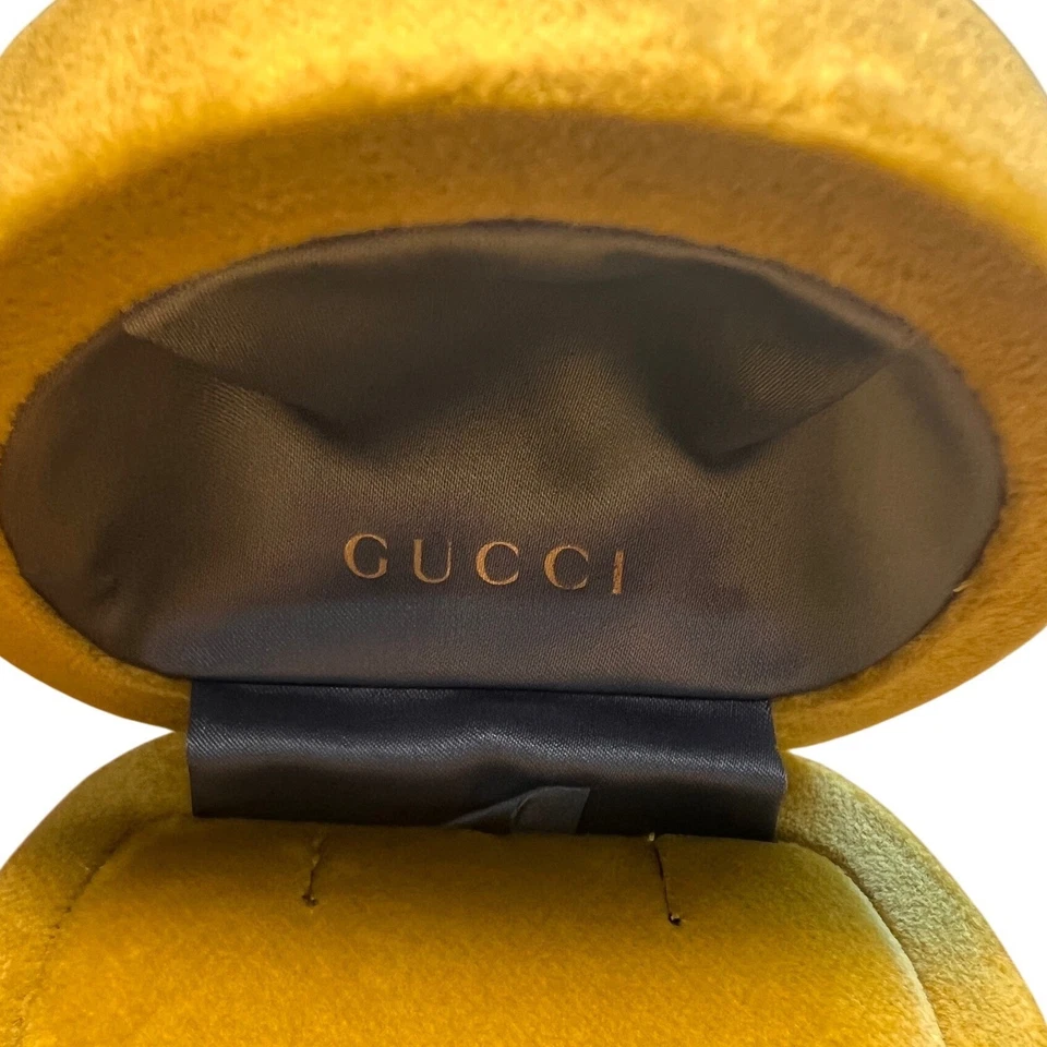 Auténtico estuche para pendientes de terciopelo amarillo Gucci Foto 2 de 4