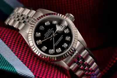 Ladies Rolex Datejust 26 mm Black Diamond Accent Dial Steel Jubilee Watch