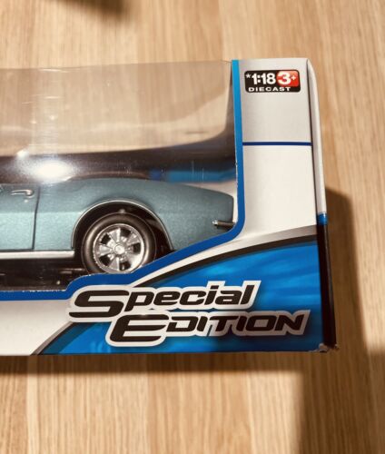 1:18 Scale 1967 Chevrolet Camaro SS 396 Convertible Turquoise Diecast Model Toy - Picture 4 of 5