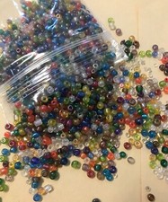 Assorted mix of 300 small round glass beads - various colors