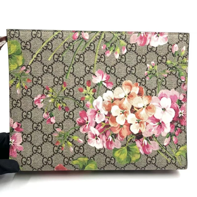 10.31 27 Gucci Multicolor Clutch