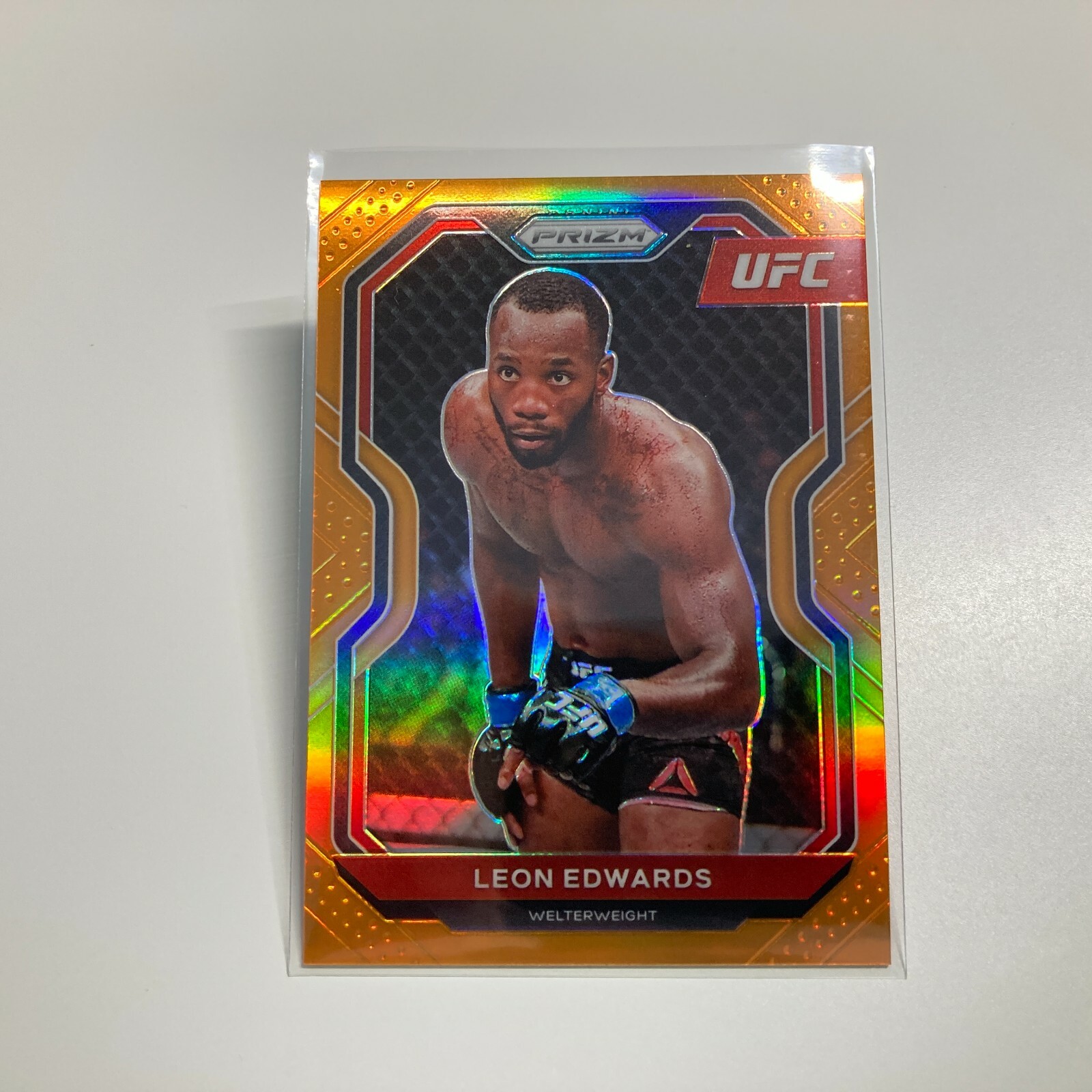 Leon Edwards 2021 Panini Prizm UFC Orange Refractor Card 33/99 #17