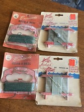 Lot 4 NOS vintage hand reel Barracuda Shur Katch on card